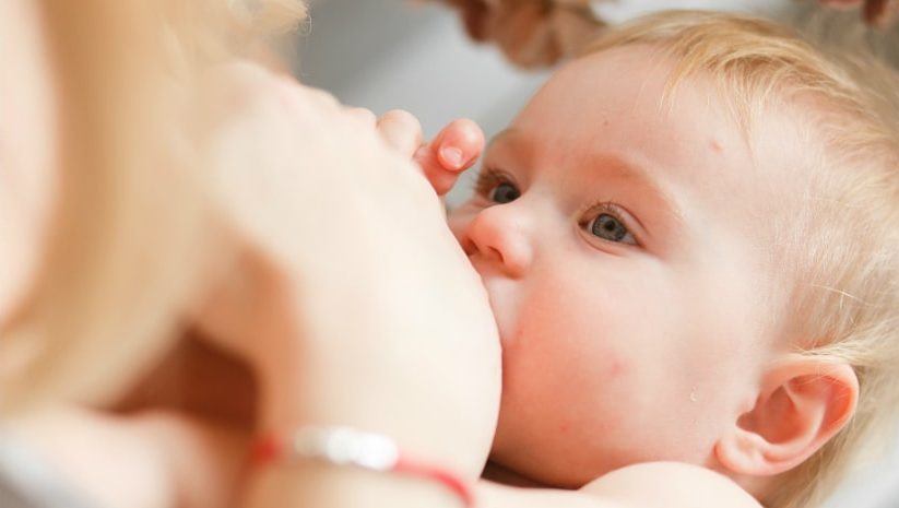 woman-feed-her-child-with-a-breast