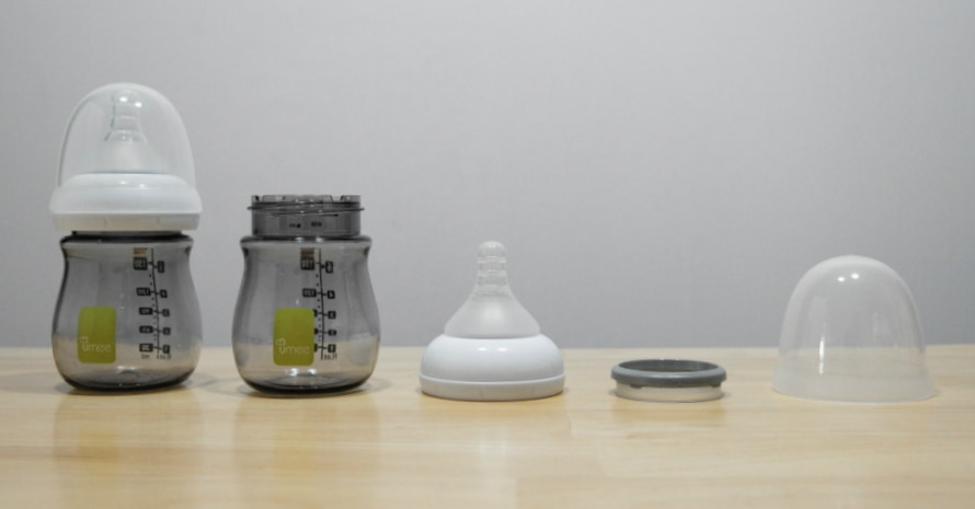 image of baby bottle components on the table