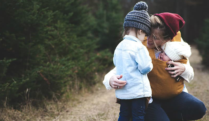 cute-daughter-and-baby-with-their-mom-daylight