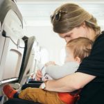 mom with babies on the plane