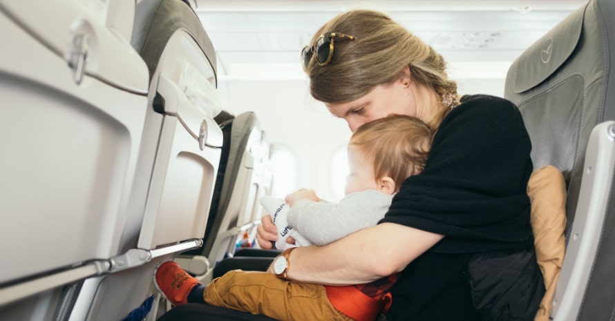 mom with babies on the plane